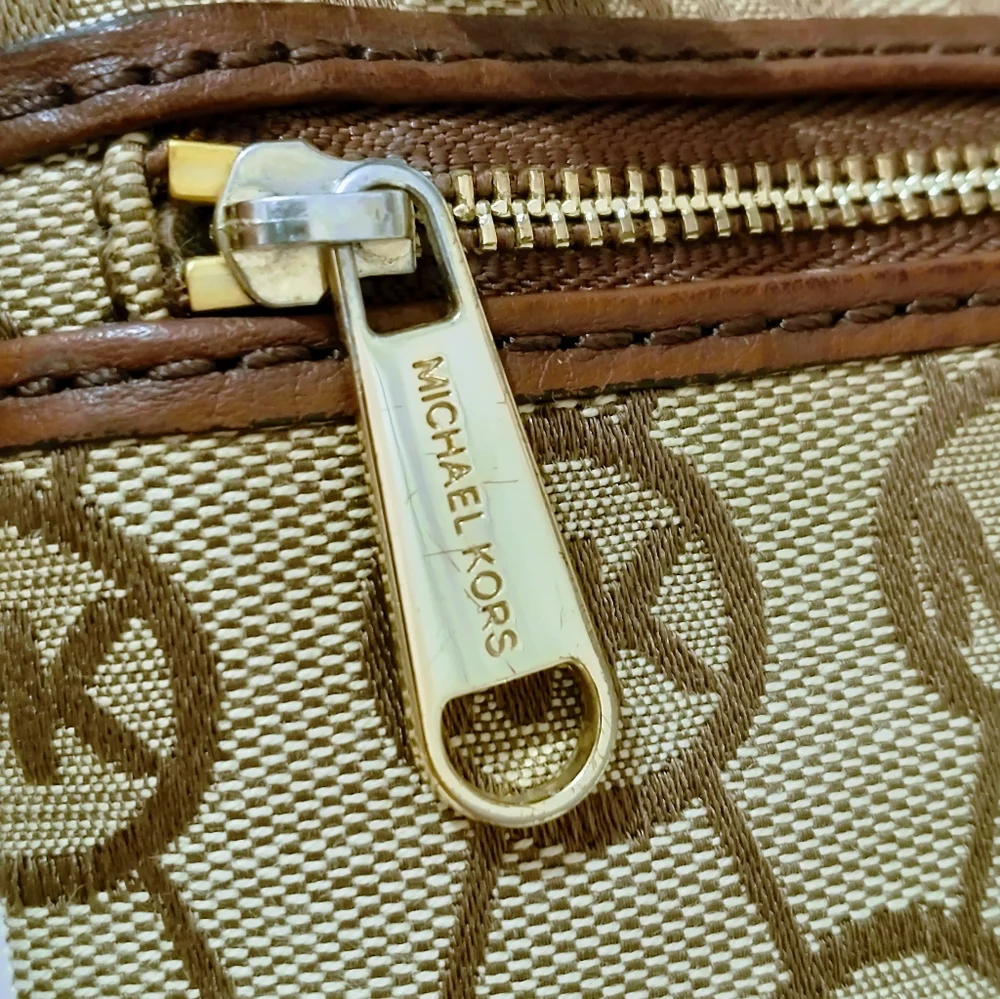 Michael Kors Monogram Wristlet.